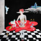 surrealist-painting-woman-kitchen,table-redskirt,-dog,apples,chess